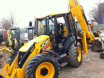 Аренда экскаватора-погрузчика JCB 5CX в аренду в Алматы