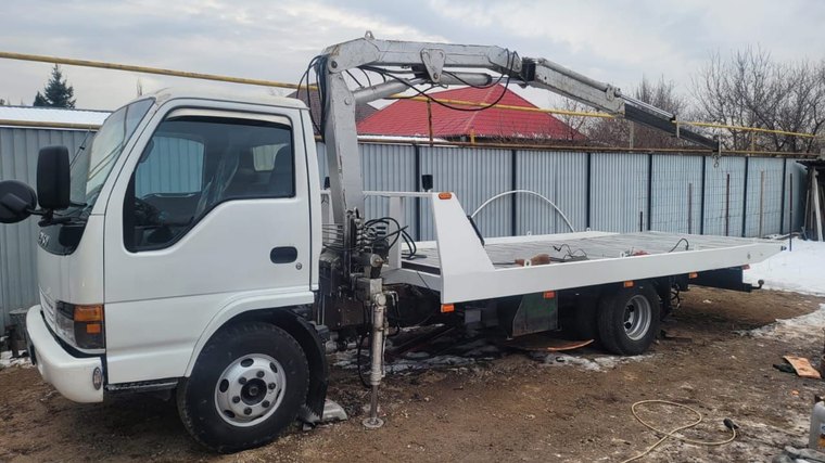 Эвакуатор-манипулятор Isuzu — автопарк Almaty Trans в Алматы