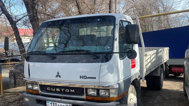 Бортовой грузовик Mitsubishi — автопарк Almaty Trans в Алматы