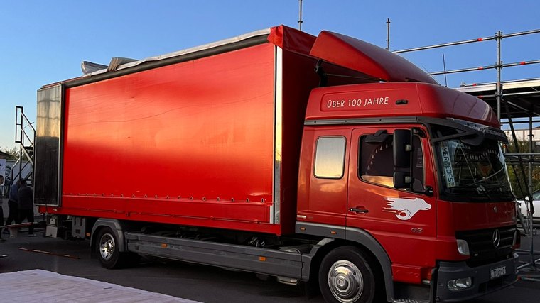 Грузовик Mercedes-Benz Atego со шторным тентом — автопарк Almaty Trans в Алматы